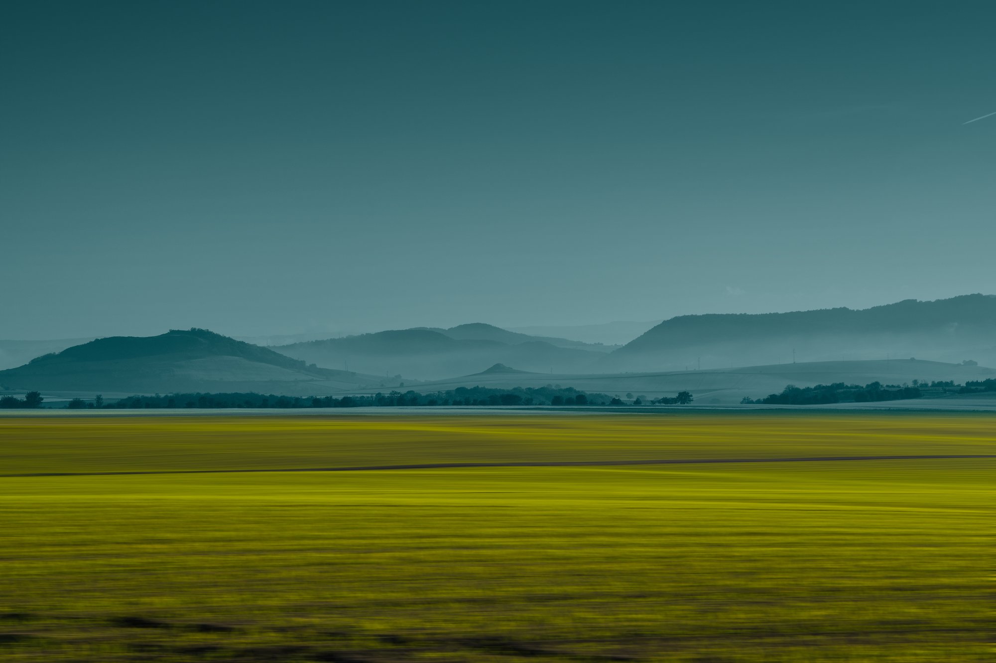 Paesaggio verde, spedizioni carbon neutral di Asendia Italia.